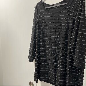 Brittany Black ruffled black top. Size 1X